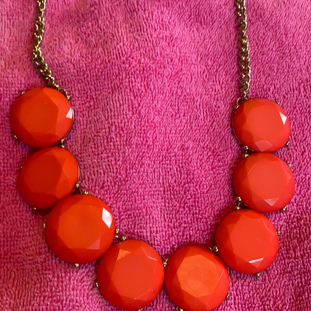 Women’s orange and gold necklace
